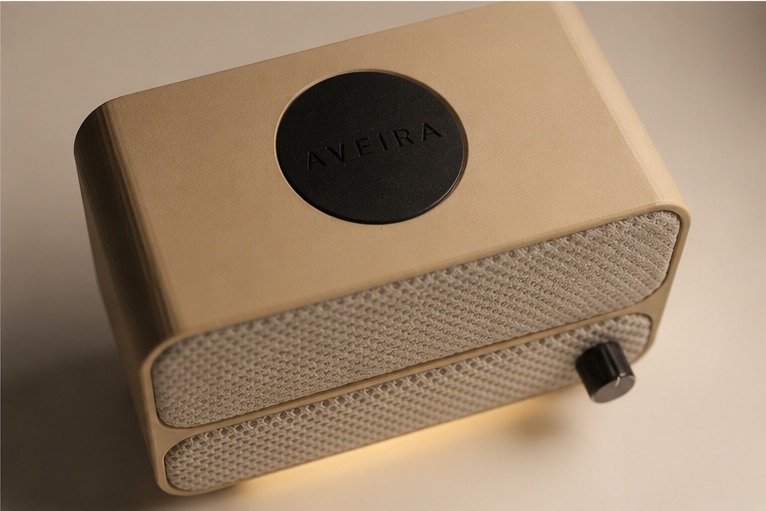 Close-up of the Aveira logo cap and speaker grille
